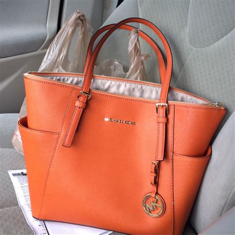 michael kors gets a buy rating from oppenheimer|michael kors handbags clearance sale.